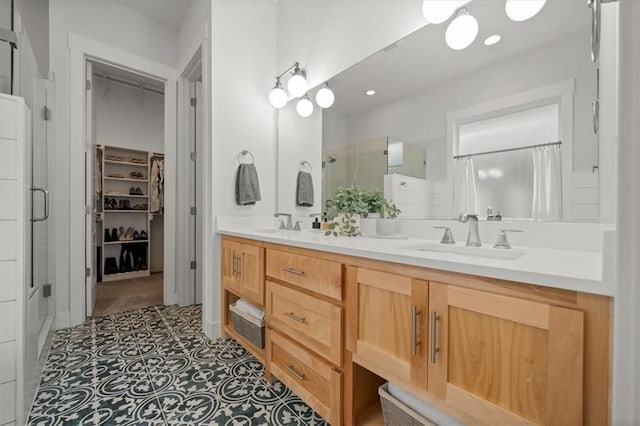 bathroom featuring vanity and walk in shower