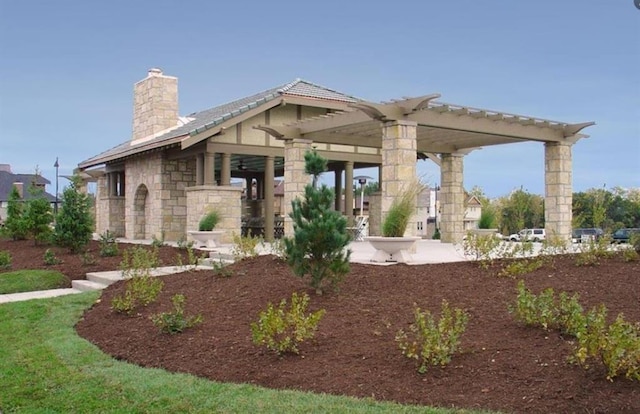 exterior space featuring a pergola