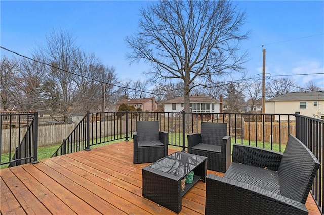 wooden deck featuring an outdoor hangout area