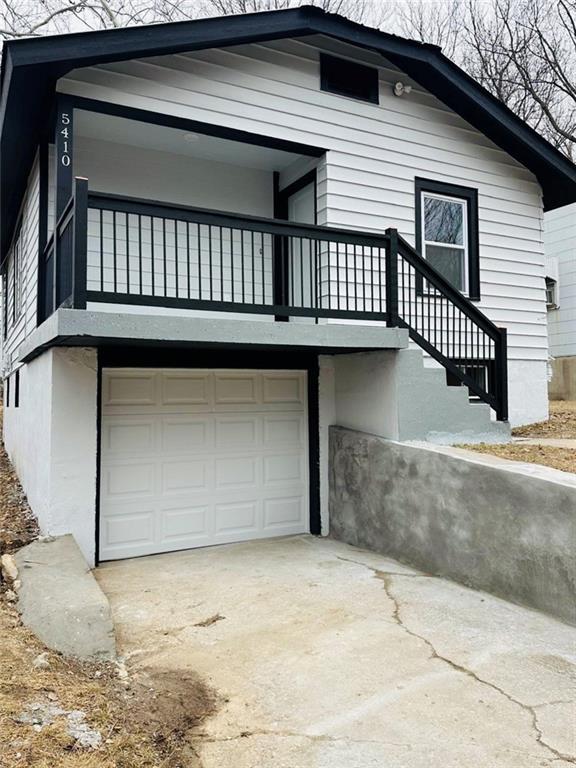 exterior space with a garage