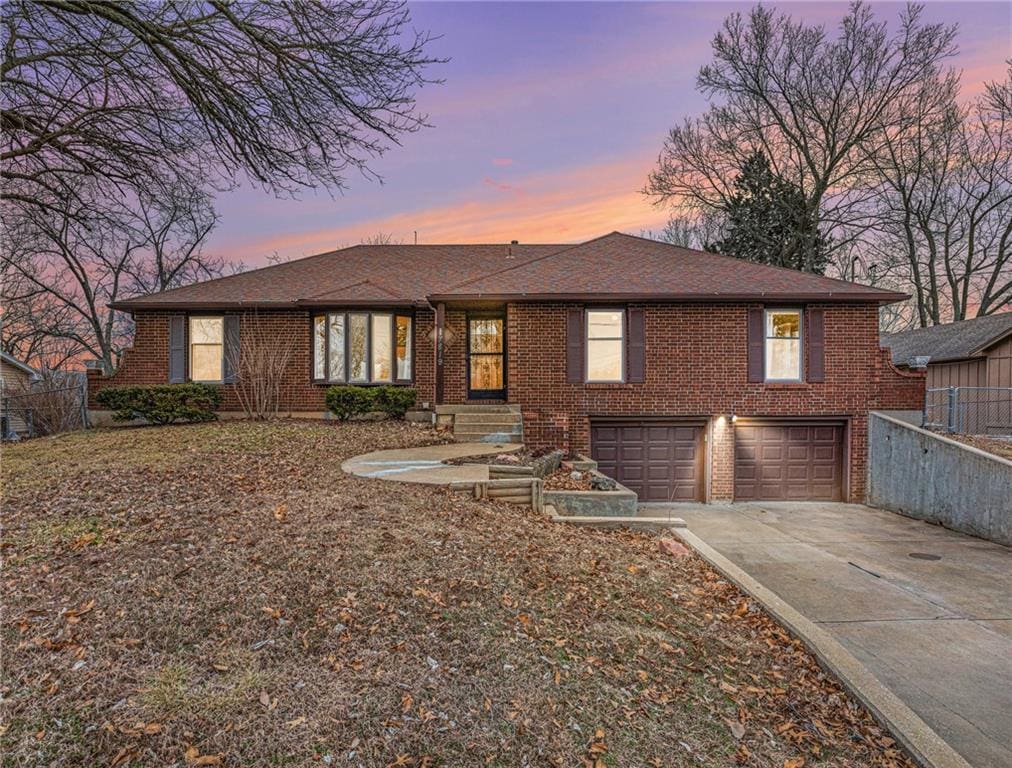 view of front of property with a garage