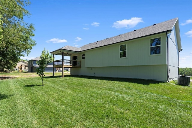 1320 N Holland Ct, Independence, MO 64056 - back of house featuring a yard and a balcony