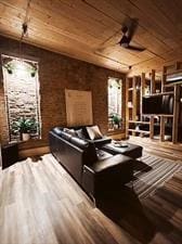 218/220 N Main St, Maryville, MO 64468 - home theater featuring hardwood / wood-style floors and wooden ceiling