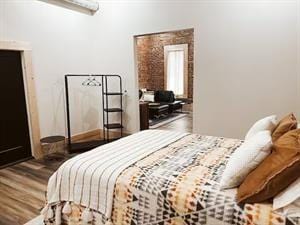 218/220 N Main St, Maryville, MO 64468 - bedroom featuring dark hardwood / wood-style flooring