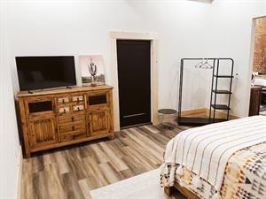 218/220 N Main St, Maryville, MO 64468 - bedroom featuring hardwood / wood-style flooring
