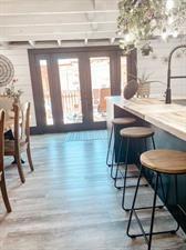 218/220 N Main St, Maryville, MO 64468 - bar with hardwood / wood-style flooring and sink