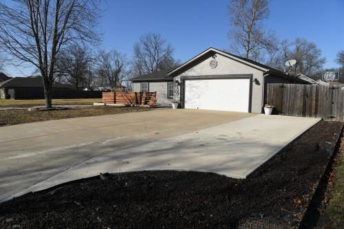 view of side of property featuring a garage