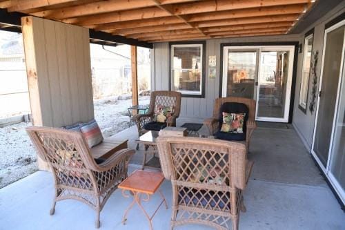 view of snow covered patio