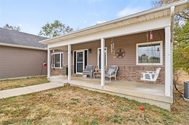 entrance to property featuring a porch