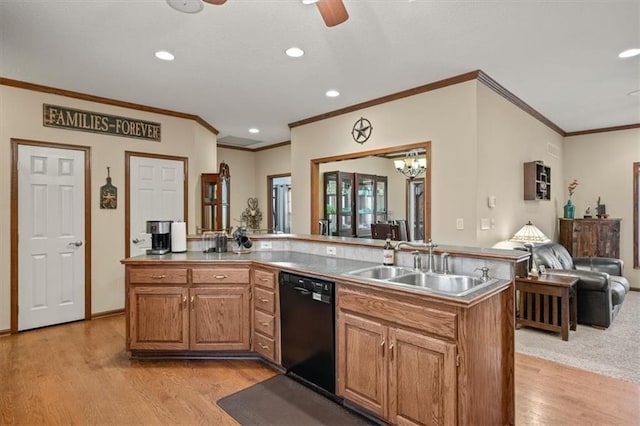 kitchen with a center island, black dishwasher, sink, and light hardwood / wood-style flooring