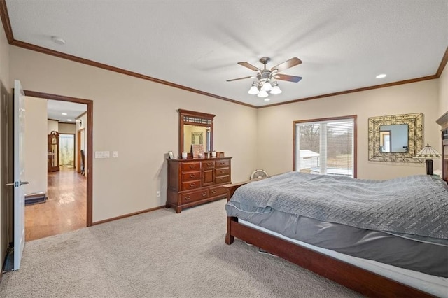 bedroom featuring ornamental molding, light carpet, and ceiling fan