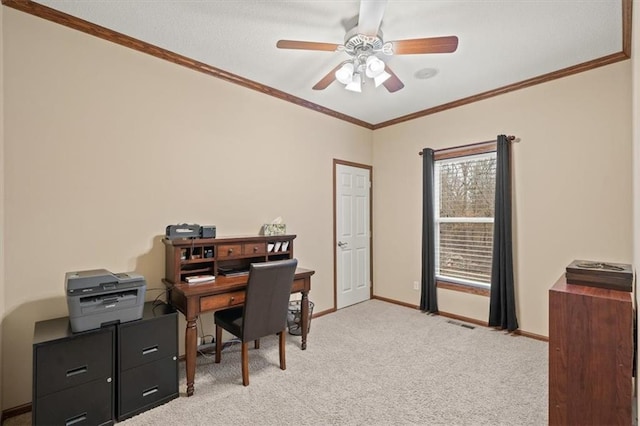 office space featuring ornamental molding, light colored carpet, and ceiling fan