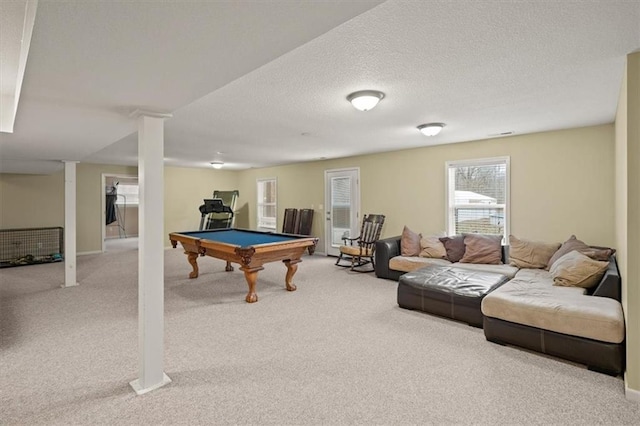 recreation room featuring billiards, carpet floors, and a textured ceiling