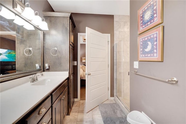 bathroom with vanity, tile patterned floors, and walk in shower