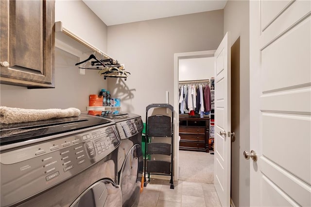 interior space with a spacious closet, washer and clothes dryer, and a closet