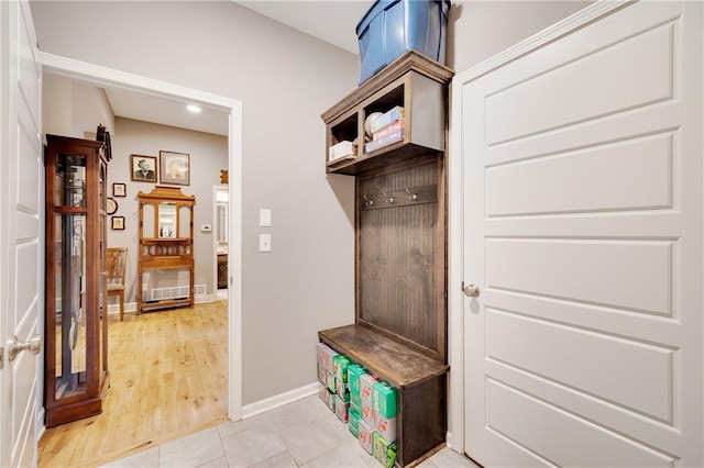 mudroom featuring light tile patterned floors