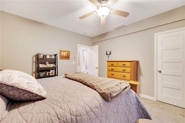 carpeted bedroom featuring ceiling fan