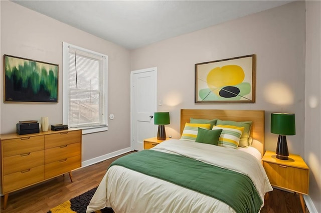 bedroom featuring dark hardwood / wood-style floors