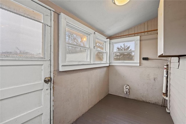 clothes washing area featuring hardwood / wood-style flooring