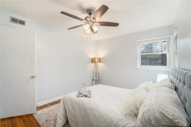 bedroom featuring wood-type flooring and ceiling fan