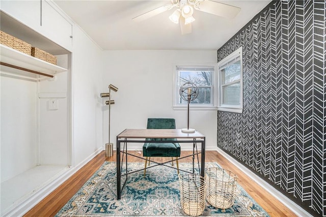 office featuring hardwood / wood-style flooring and ceiling fan