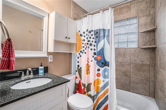 full bathroom featuring vanity, toilet, and shower / bath combo with shower curtain