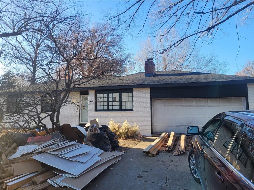 view of side of property featuring a garage