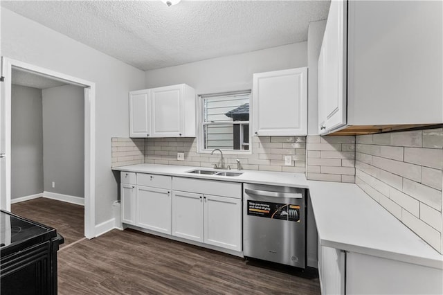 kitchen featuring sink, dark wood-type flooring, dishwasher, white cabinetry, and tasteful backsplash