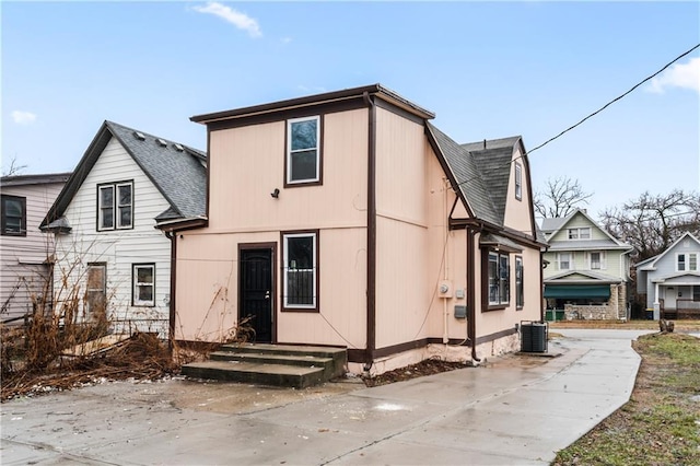 back of property with cooling unit