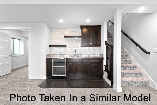 bar with recessed lighting, beverage cooler, stairway, decorative backsplash, and dark colored carpet