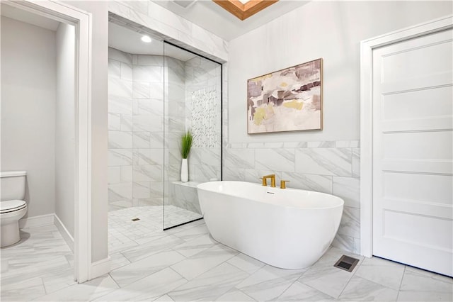22109 W 93rd Ter, Lenexa, KS 66220 - bathroom featuring marble finish floors, a freestanding bath, and a walk in shower