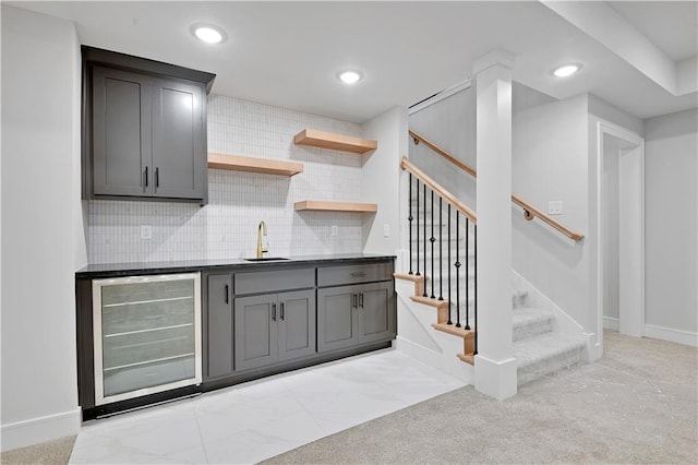22109 W 93rd Ter, Lenexa, KS 66220 - indoor wet bar with wine cooler, stairway, recessed lighting, tasteful backsplash, and light colored carpet