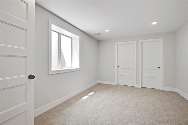 22109 W 93rd Ter, Lenexa, KS 66220 - unfurnished bedroom with light carpet and recessed lighting