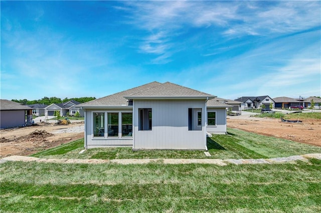 22109 W 93rd Ter, Lenexa, KS 66220 - rear view of house with a lawn and a residential view