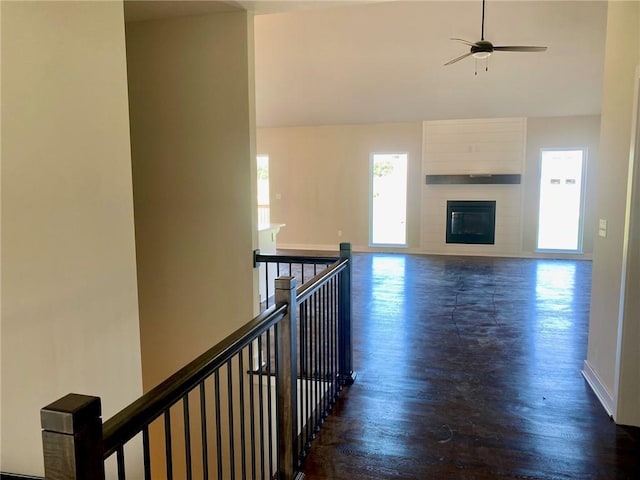 1102 Noah Ln, Kearney, MO 64060 - hallway with dark wood-type flooring, an upstairs landing, and lofted ceiling