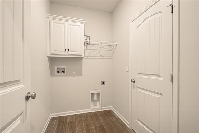 1102 Noah Ln, Kearney, MO 64060 - laundry room with hookup for an electric dryer, hookup for a washing machine, dark wood-style flooring, and cabinet space