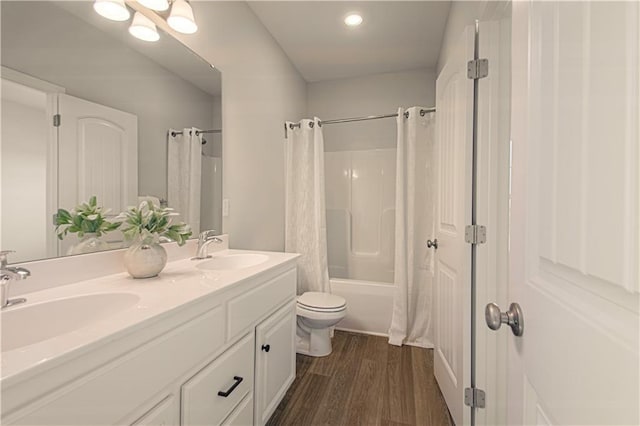1102 Noah Ln, Kearney, MO 64060 - full bath with wood finished floors, double vanity, shower / bath combo, and recessed lighting