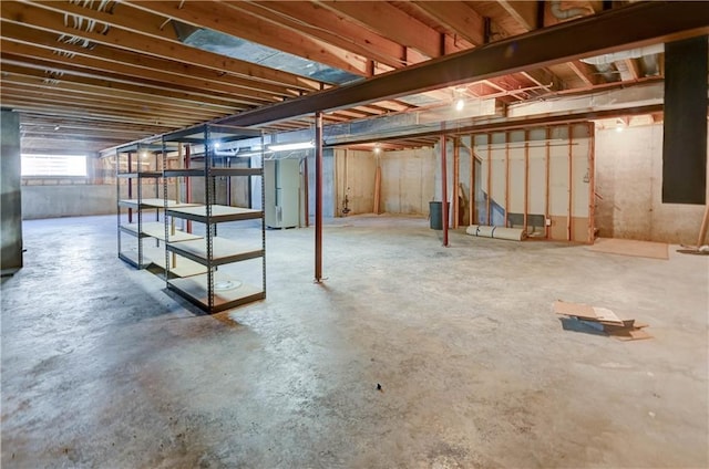 basement featuring water heater