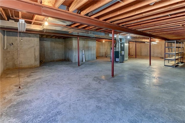 basement featuring heating unit