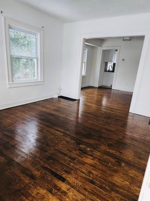 interior space with dark hardwood / wood-style floors