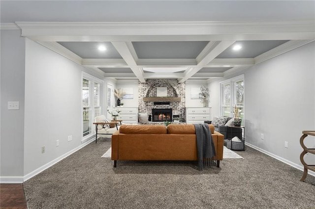 carpeted living room featuring coffered ceiling, a fireplace, plenty of natural light, and beam ceiling