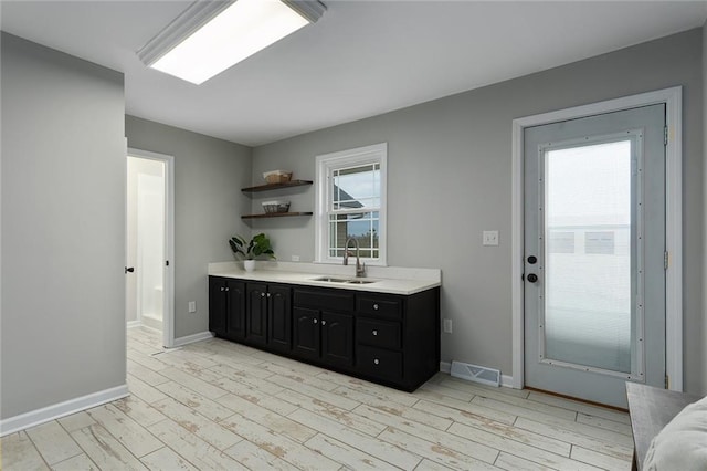 bathroom featuring hardwood / wood-style flooring and vanity