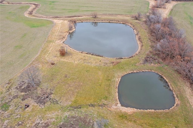 aerial view featuring a water view and a rural view