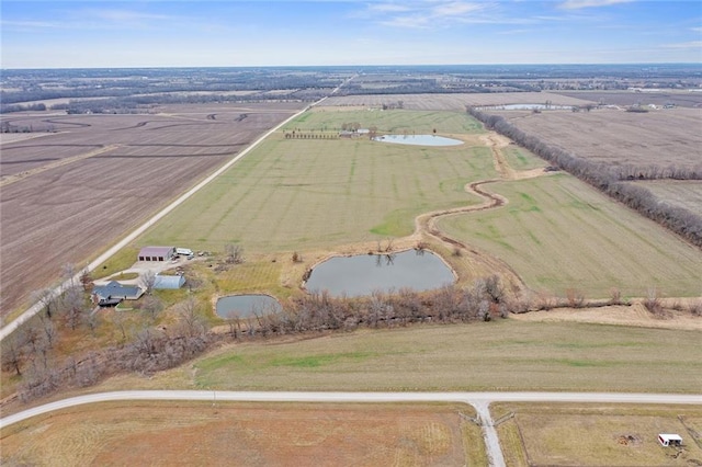 aerial view with a water view and a rural view