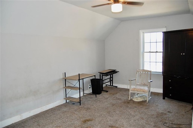 office area with vaulted ceiling, carpet floors, and ceiling fan