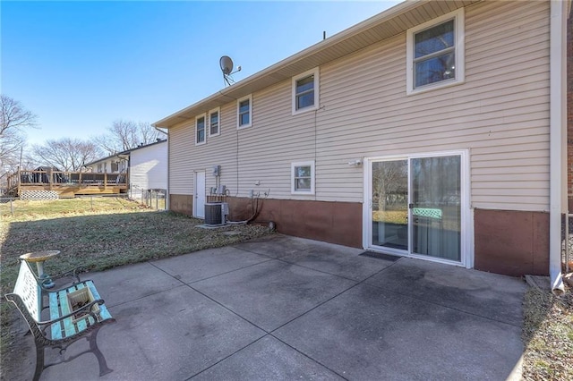 back of house featuring a patio and central air condition unit