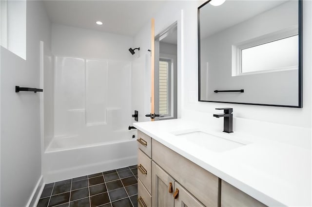 bathroom with tile patterned flooring, shower / tub combination, and vanity