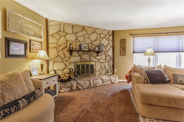 carpeted living area with a fireplace