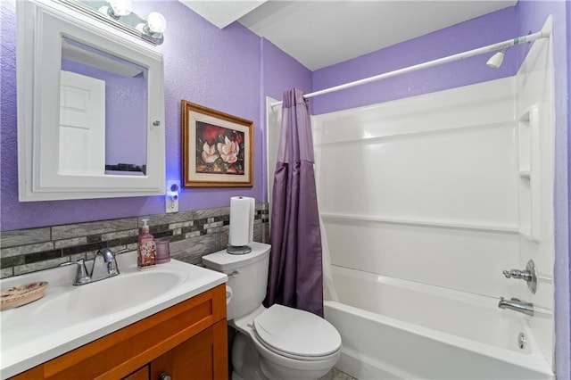 full bathroom with backsplash, toilet, vanity, and shower / bath combo