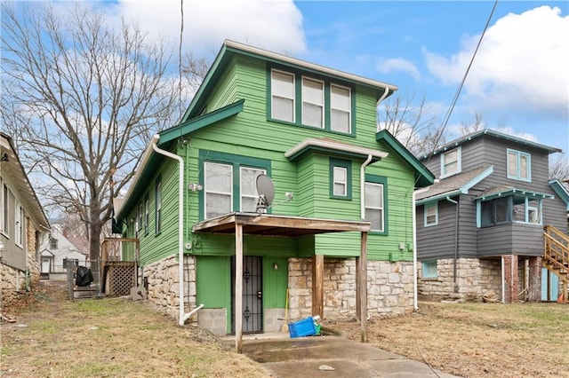 view of front of house with stairway